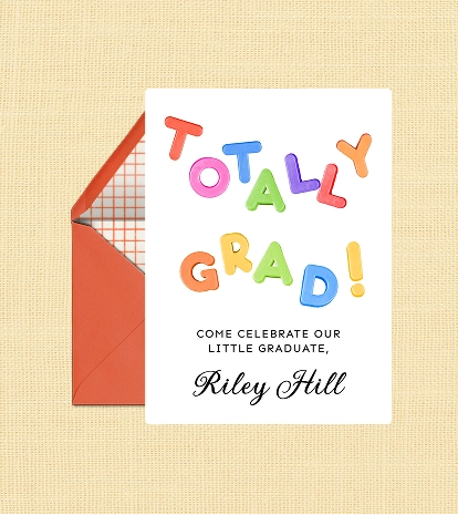 A colorful graduation party invitation that says "Totally grad!" in bold block letters, paired with a red envelope on a yellow background.
